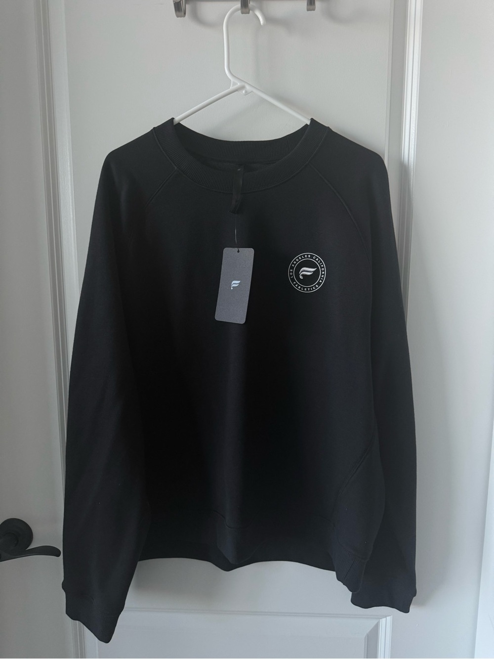 NWT. Fabletics Men's Black Crewneck Sweatshirt with Small Chest Logo